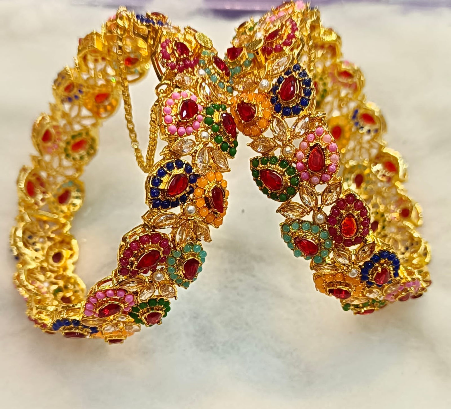 Artificial Open Bangles Through the Ages: History and Evolution