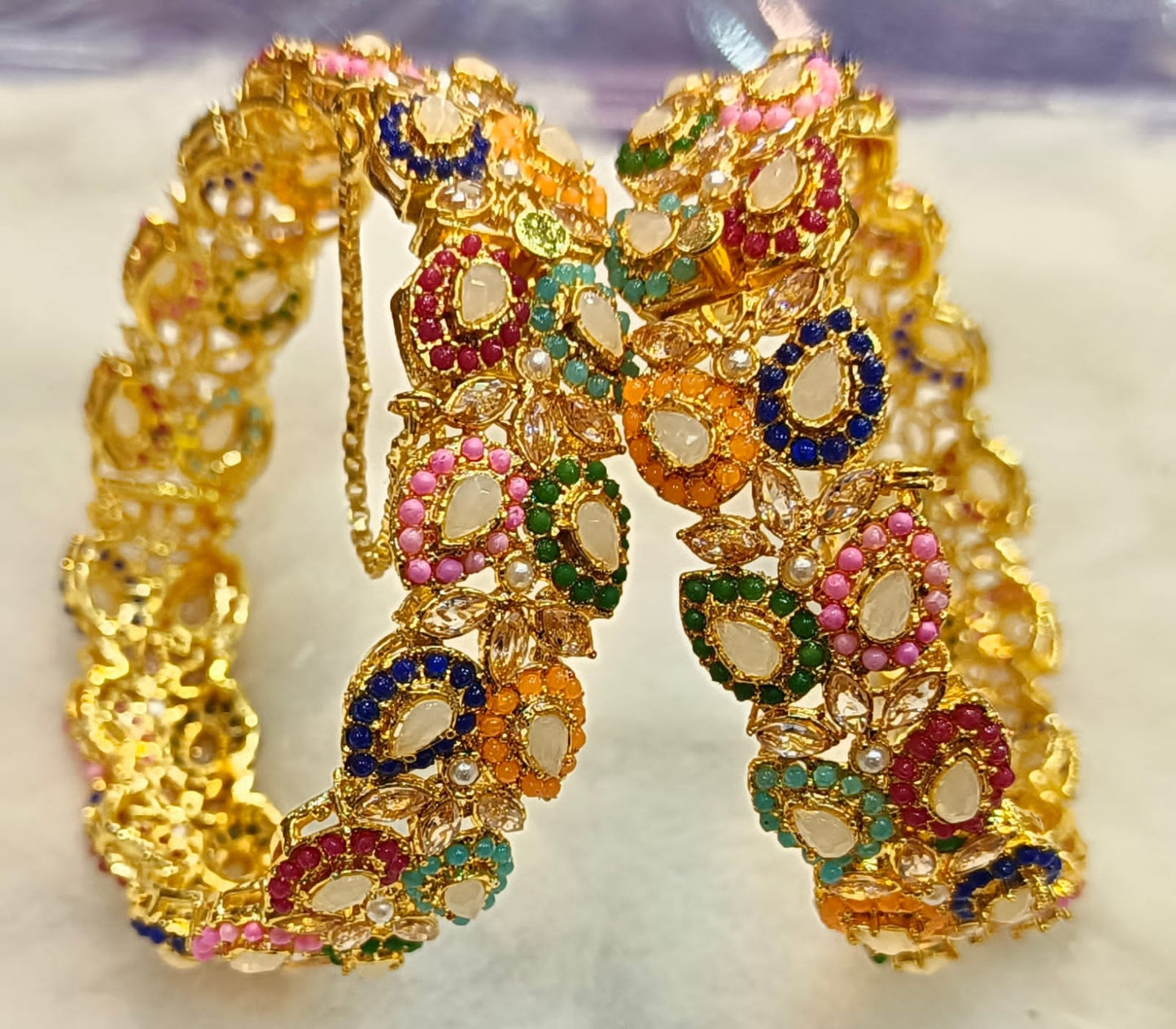 Artificial Open Bangles Through the Ages: History and Evolution