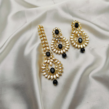 Light weight earrings and teeka set with sheesha stones and pearl drops.